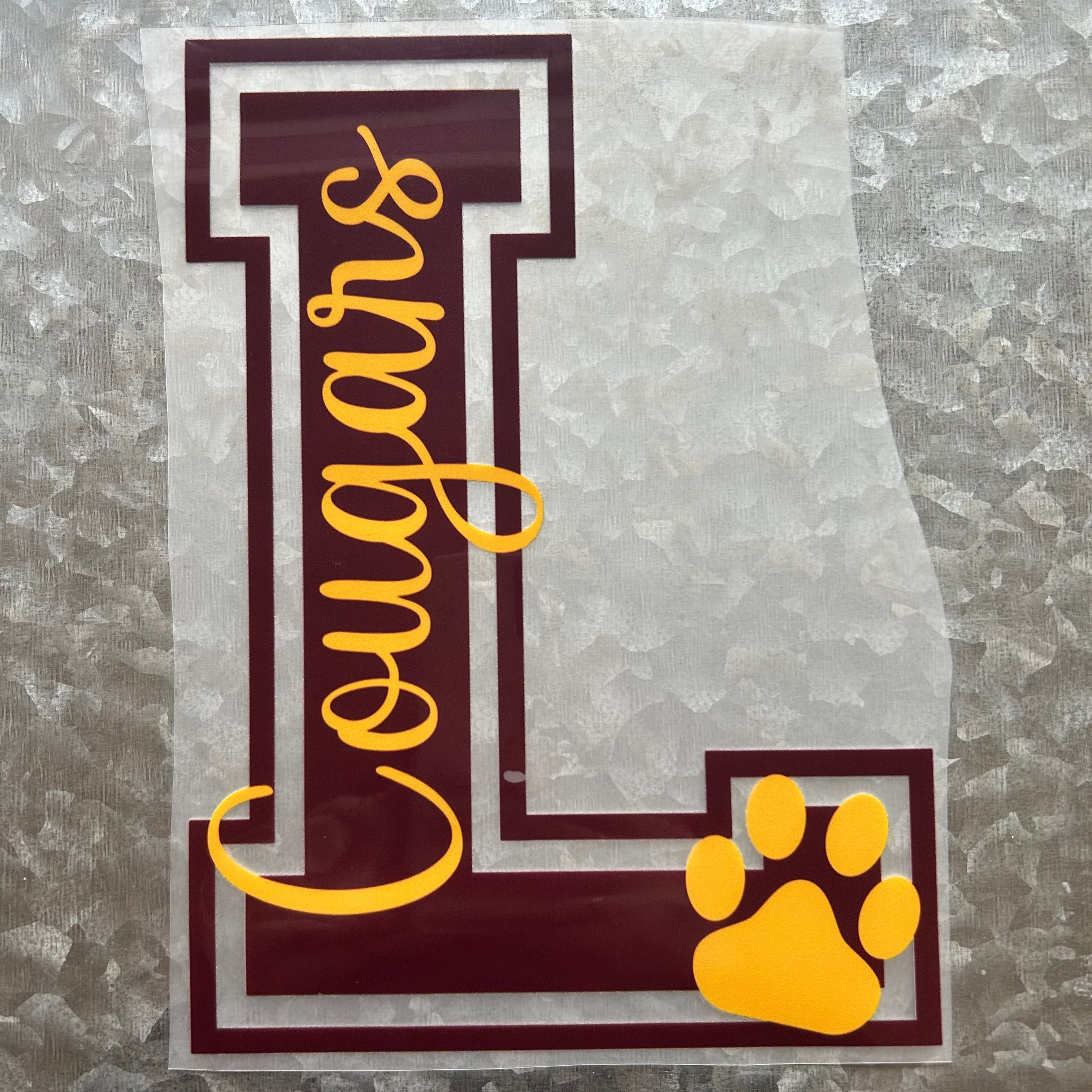 "L Cougars" with Paw